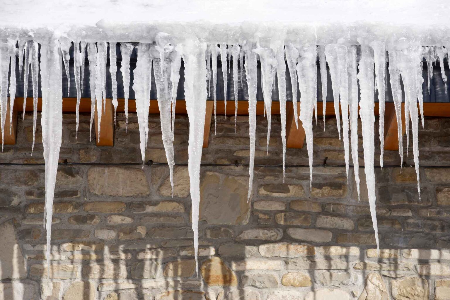 Do Gutter Guards Prevent Ice Dams? TaylorMade Roofing