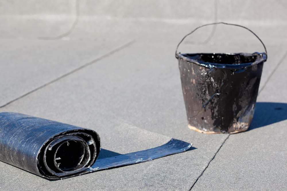 Tools on a self-adhered rooftop