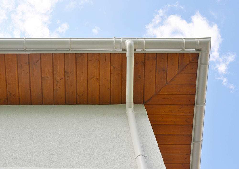 Photo-From-Below-of-Downspout-Attached-to-Gutter