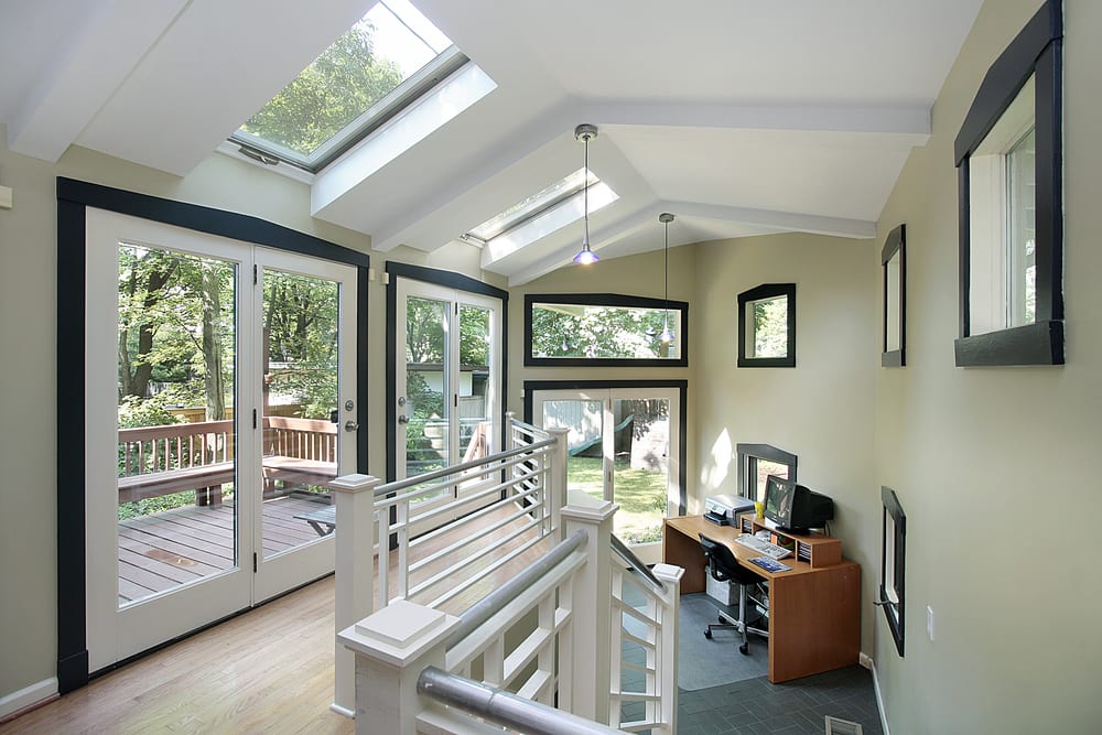 Two skylights in office that leads out to deck
