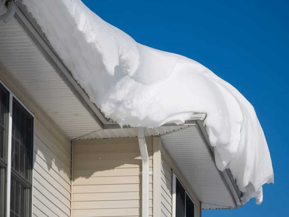 Close-up of heavy snow on roof