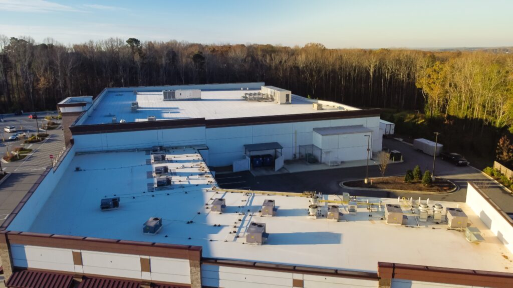 rooftop of grocery store and strip mall