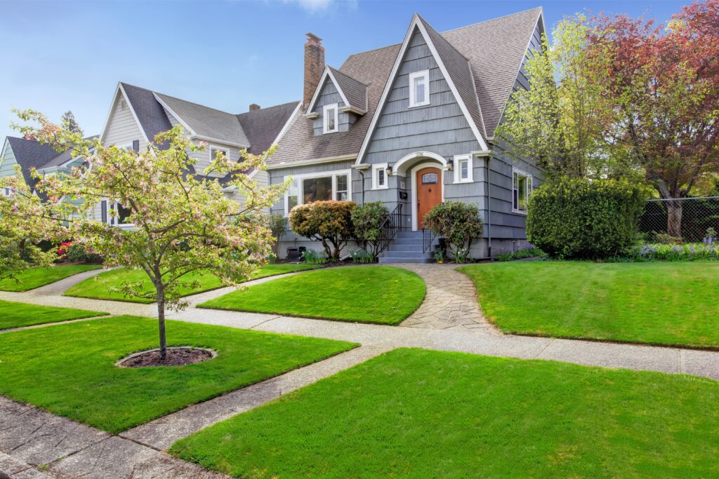 Beautiful home with manicured lawn