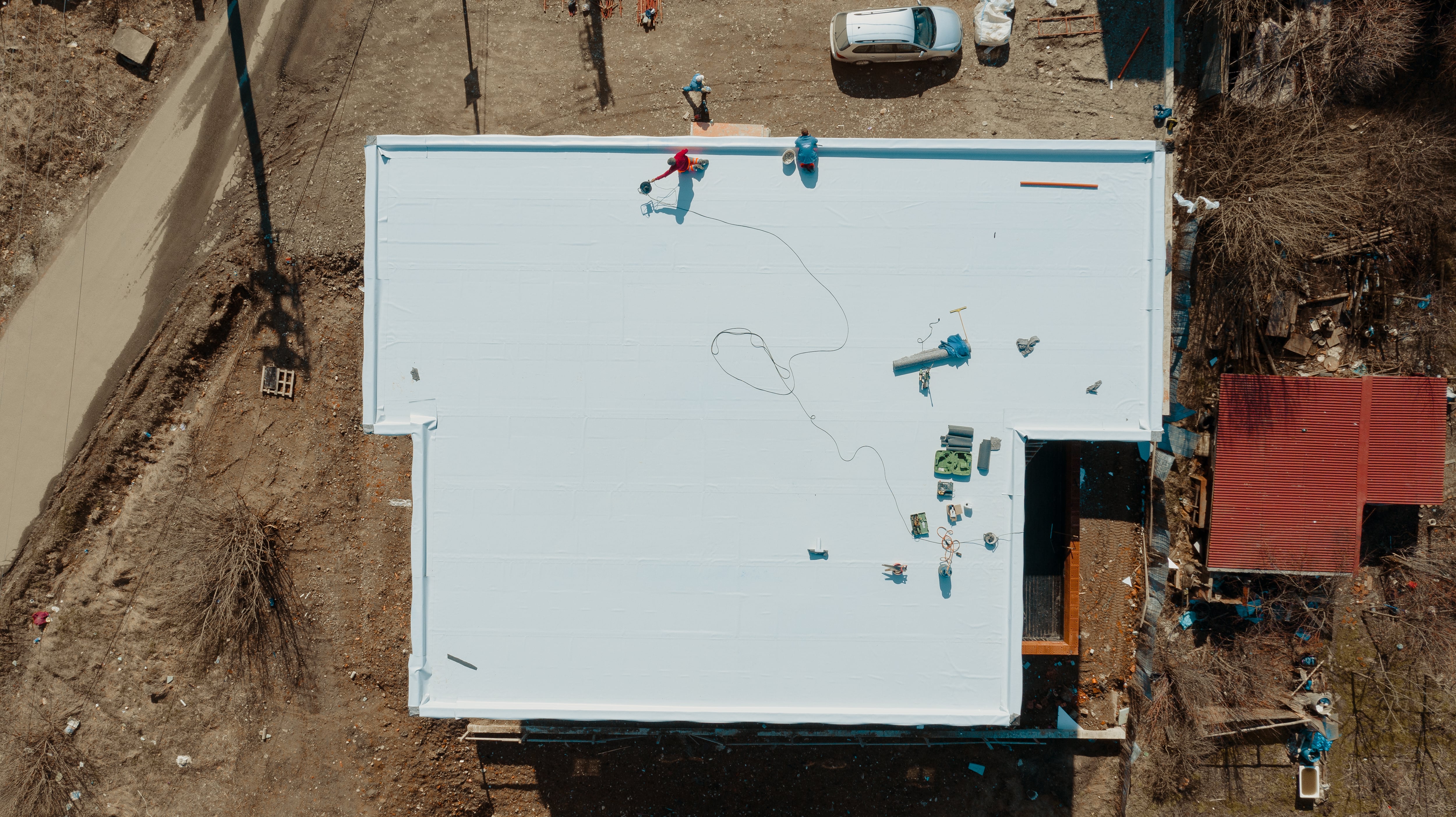 Aerial view of apartment building with flat roof