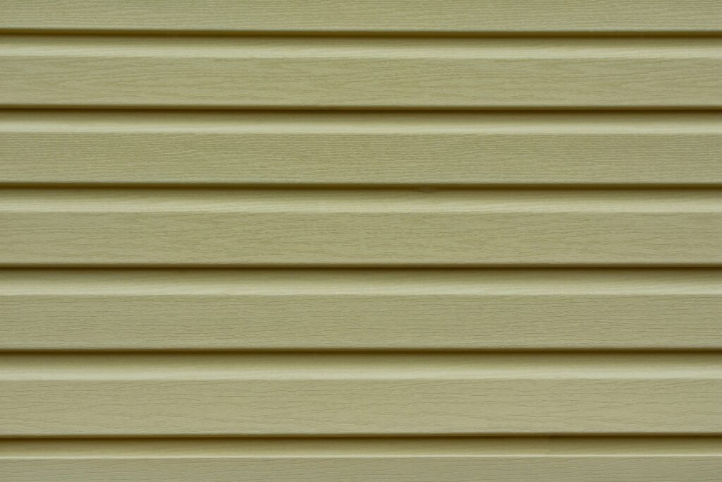 Close-up of green siding